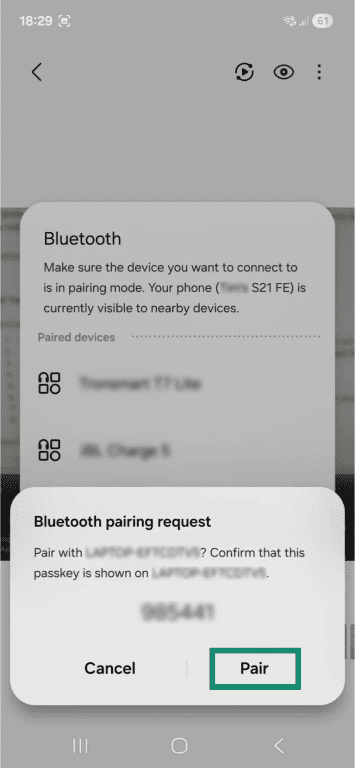 A Bluetooth pairing request on an Android phone. The 
